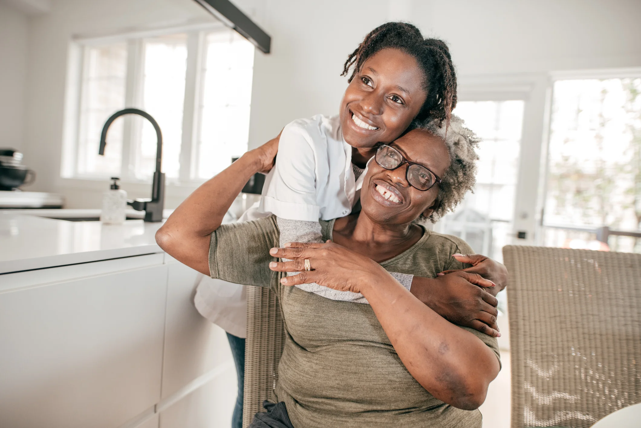 Family caregiver reviewing Georgia and Indiana SFC program options at home